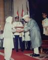 Captain Sunil Khokhar's mother Smt Suraj Mukhi Devi receiving Vir Chakra award from the President