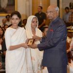 Mother Smt Anita Devi and wife Smt Sujata Dahiya receiving "Shaurya Chakra" from the President