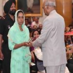 Sowar Vijay Kumar's wife Smt Menaka receiving "Kirti Chakra" award