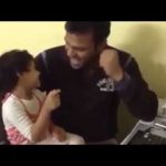 Maj Mukund Vardarajan singing along with his daughter