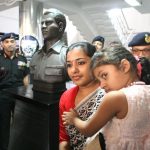 Maj Mukund Varadarajan's wife and daughter with his statue