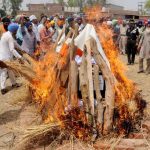 Army personnel and villagers perform cremation of Late Naib Subedar Paramjit Singh at his village Vain Poin