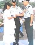 His wife receiving Vayu Sena Medal