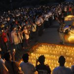 Hundreds of people holding candles and flowers in their hands participated in the tribute function for Lt Khajuria