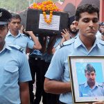 IAF personnel carry the mortal remains of Flight Lt Tapan Kapoor during his last journey in New Delhi