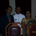 Suraj Pillai with his parents